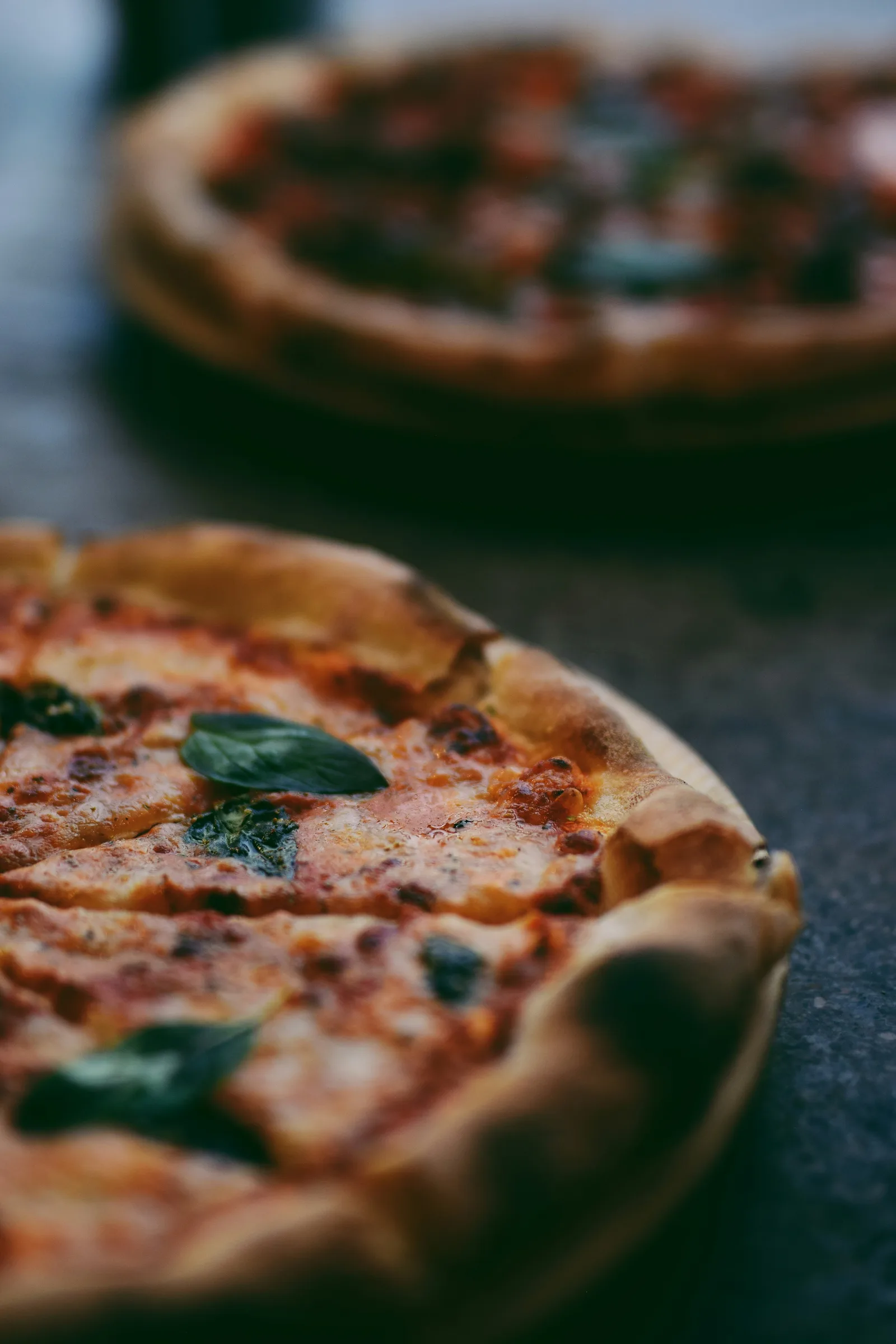 Pizzaiolo stretching dough